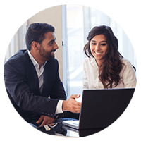 Man and woman working together on a laptop